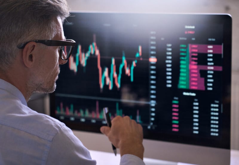 Trader Reading Price Action on Platform